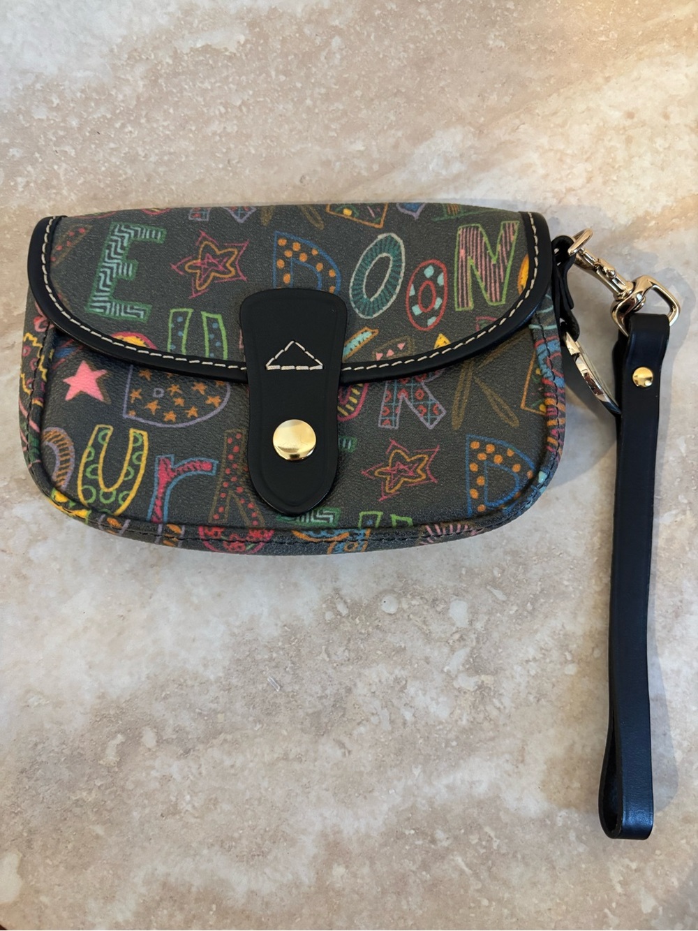 Dooney & Bourke Multicolored graffiti logo letter coated canvas pouch wristlet